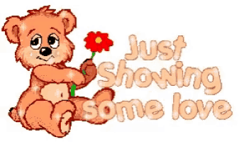a teddy bear is holding a red flower with the words just showing some love below it