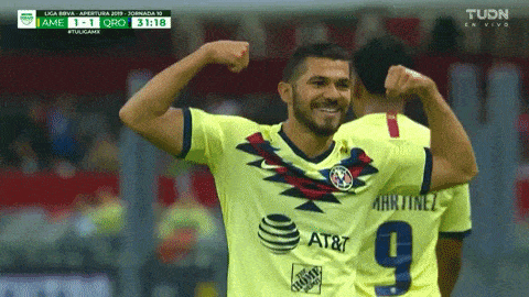 a soccer player wearing a yellow jersey with the number 9 on it