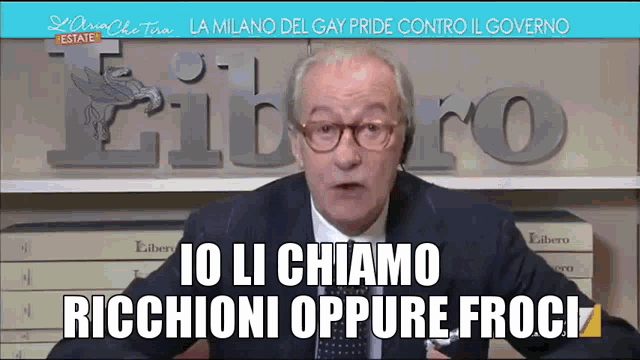 a man in a suit says io li chiamo riccioni oppure froci