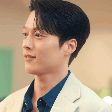 a close up of a man 's face with the name anneji visible