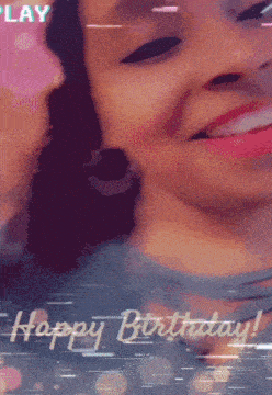 a close up of a woman 's face with the words happy birthday written on the bottom