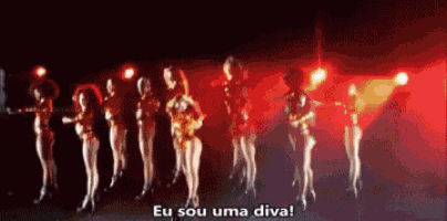 a group of women are dancing with the words eu sou uma diva in the background