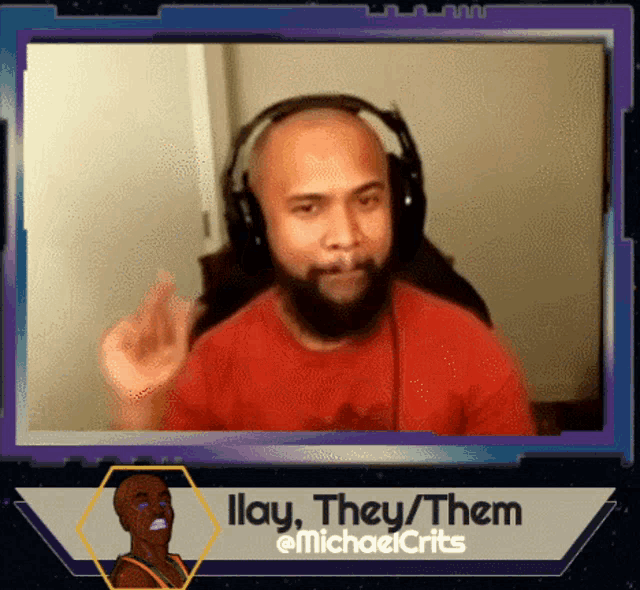 a man wearing headphones and a red shirt with the words ilay they them on the bottom