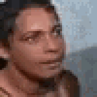 a close up of a man 's face with his eyes closed .