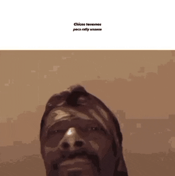 a close up of a man 's face with a beard and mustache .