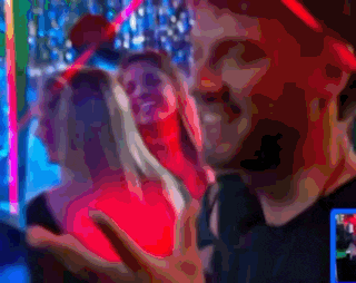 a blurry picture of a man in a red hat