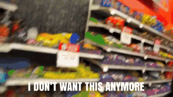 a blurry picture of a grocery store with the words " i don 't want this anymore "