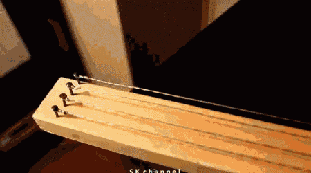 a wooden plank with screws on it and the words sk channel below
