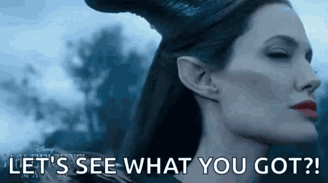 a woman with horns on her head and the words `` let 's see what you got '' .