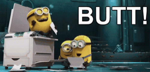 a couple of minions standing next to a printer with the word butt written on it