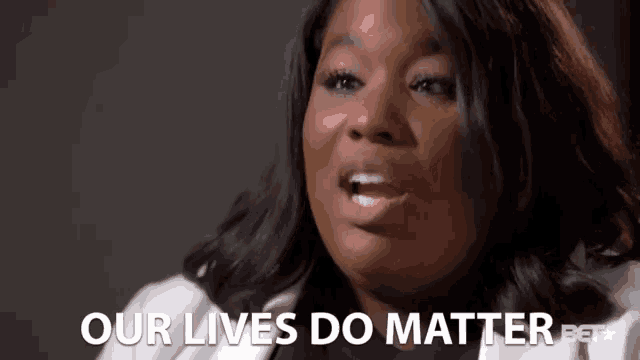 a woman is saying our lives do matter