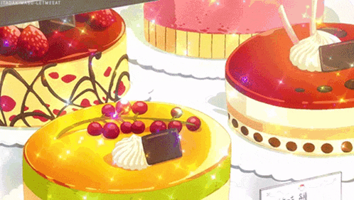 a bunch of cakes are sitting on top of a table .