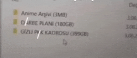 a blurred image of a computer screen that says anime arjini