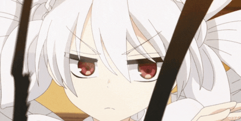 a girl with white hair and red eyes is looking at something