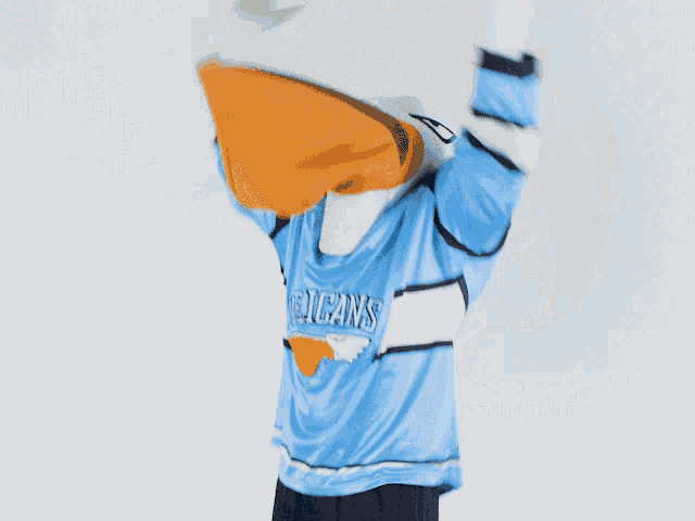a pelican mascot wearing a pelicans jersey