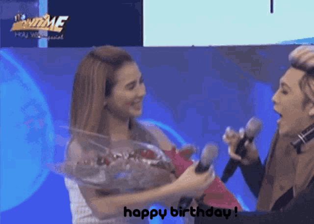 a man is giving a woman a bouquet of flowers with the words happy birthday written on the bottom