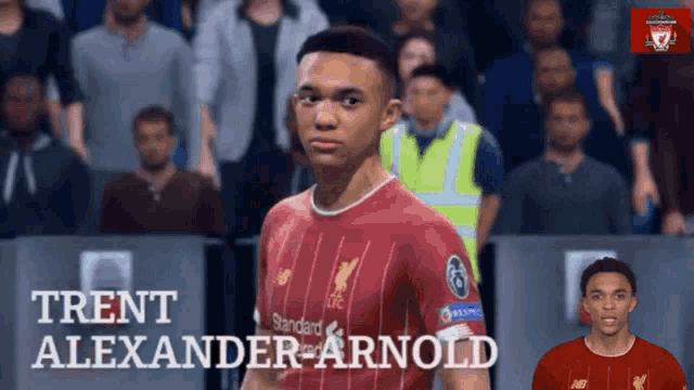 trent alexander arnold stands in front of a crowd wearing a red jersey