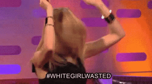 a woman is dancing on a stage with her hands in the air and the words `` whitegirlwasted '' written on the bottom .
