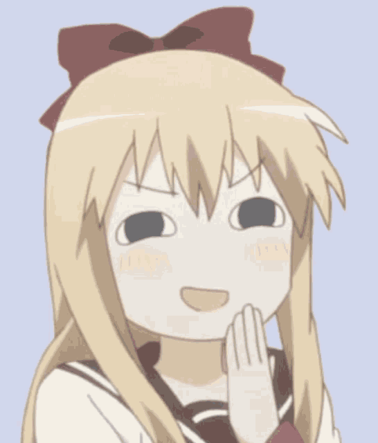a girl with blonde hair and a red bow on her head