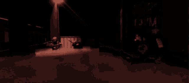a dark room with a red sign that says coma