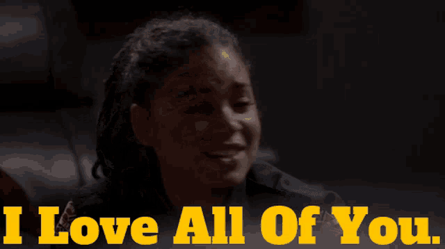 a woman says i love all of you in a dark room