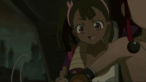 a girl with pigtails and a crown on her head