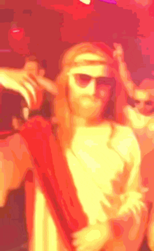 a blurry picture of a man in a jesus costume