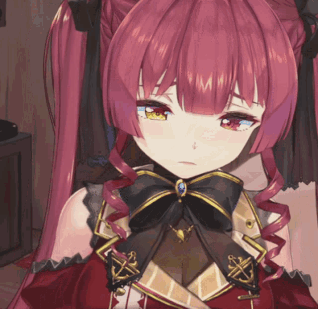 a close up of a girl with red hair and a black bow