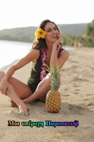 a woman is sitting on the beach with a pineapple and a flower in her hair ..