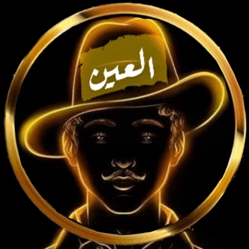 a man wearing a cowboy hat with arabic writing