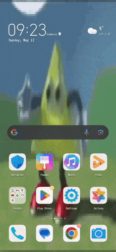 a phone screen shows the time of 9:23 on sunday may 12th