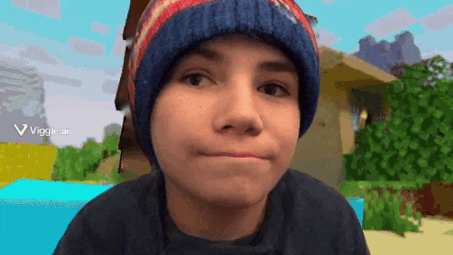 a young boy wearing a beanie looks at the camera with the words viggle ai visible in the corner