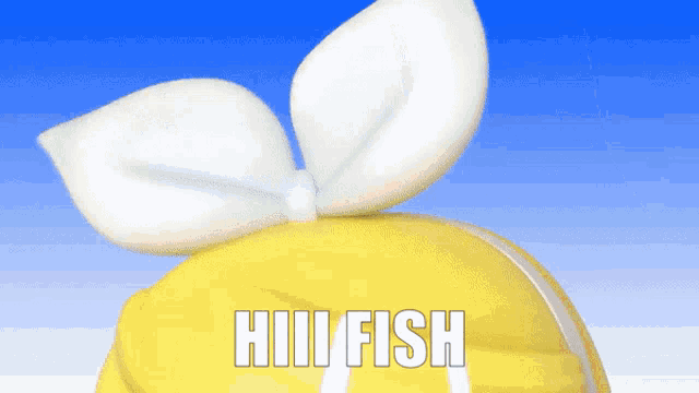 a yellow object with a white bow and the word hillfish written on it