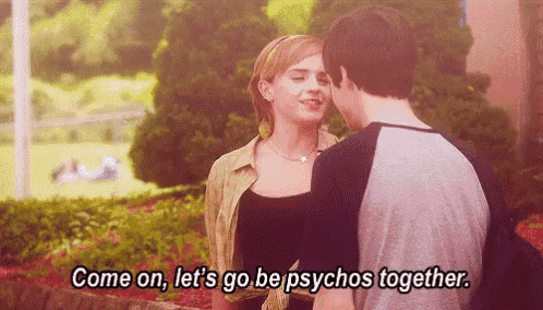 a man and a woman are standing next to each other and the man says come on let 's go be psychos together