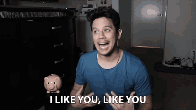 a man in a blue shirt says " i like you like you "