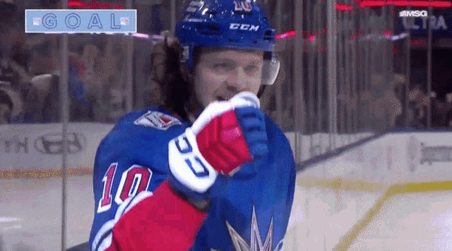 a hockey player with the number 10 on his shirt