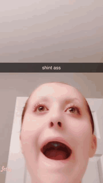 a snapchat of a girl with a caption that says ' shint ass '
