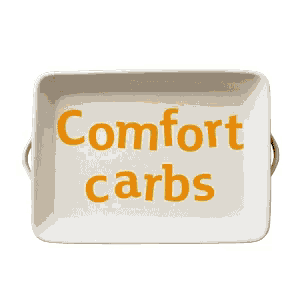 a casserole dish filled with macaroni and cheese with a white background