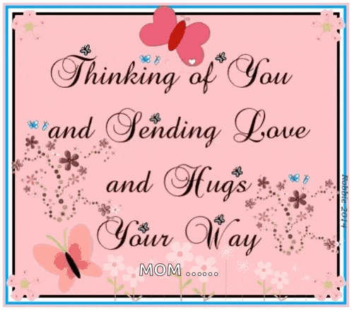 a pink card that says thinking of you and sending love and hugs your way mom