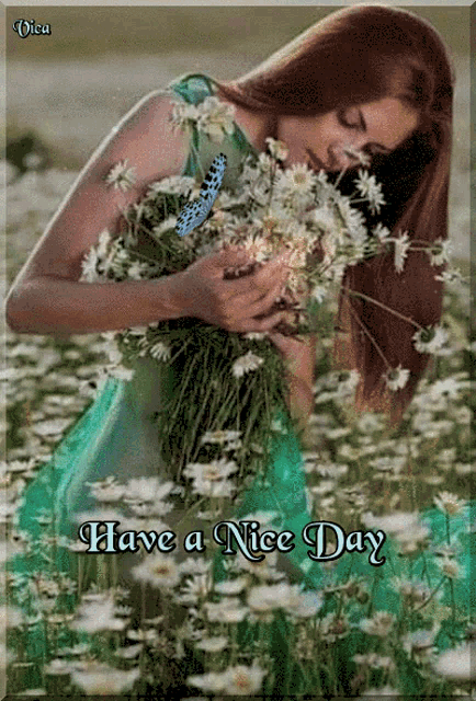 a picture of a woman holding flowers with the words have a nice day below