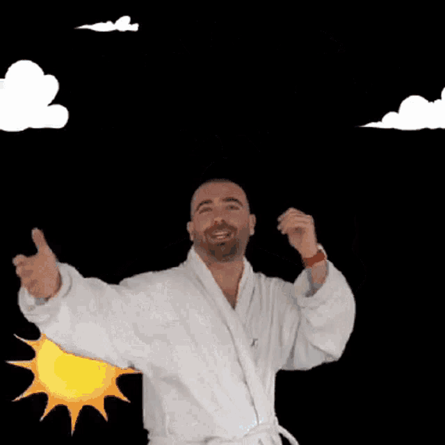 a man in a bathrobe is giving a thumbs up in front of a sun and clouds with hebrew writing