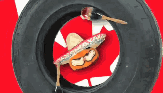 a cartoon of a pumpkin wearing a sombrero and a mustache