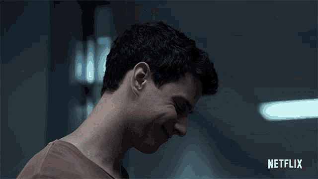 a close up of a man 's face with the netflix logo in the corner
