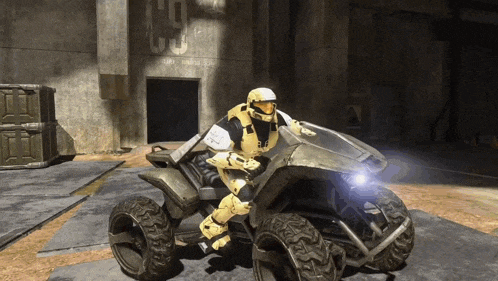a man in a helmet is riding a vehicle with the number 10 written on it