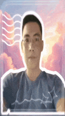 a man with glasses and a blue shirt is taking a selfie