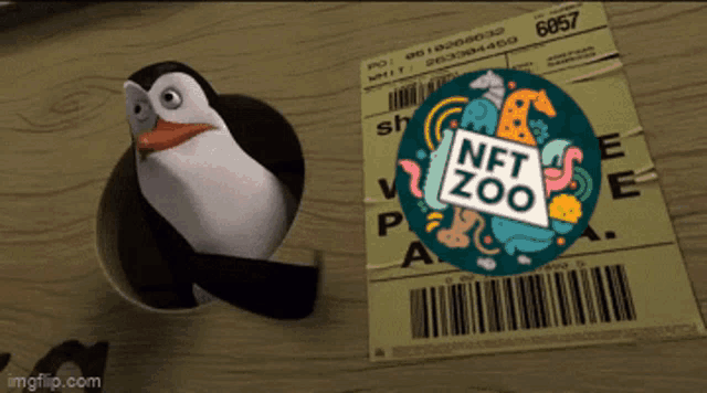 a penguin is sitting next to a nft zoo sticker