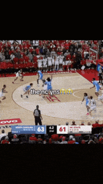 a basketball game between north carolina and nc state with the score at 61 to 63