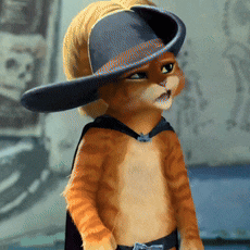 a cat wearing a hat and cape is standing in a room