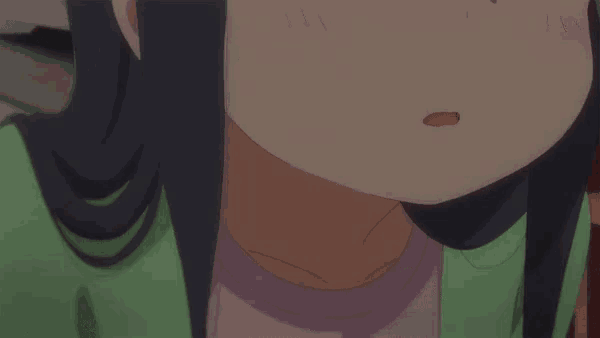 a close up of a person 's face with a pink nose