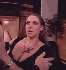 a woman with a cross necklace on her chest